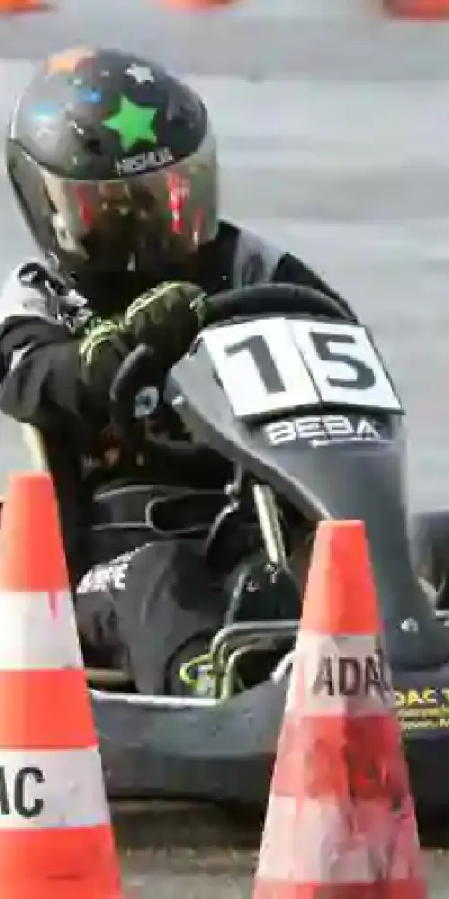 the boat sails on the sea among the plants